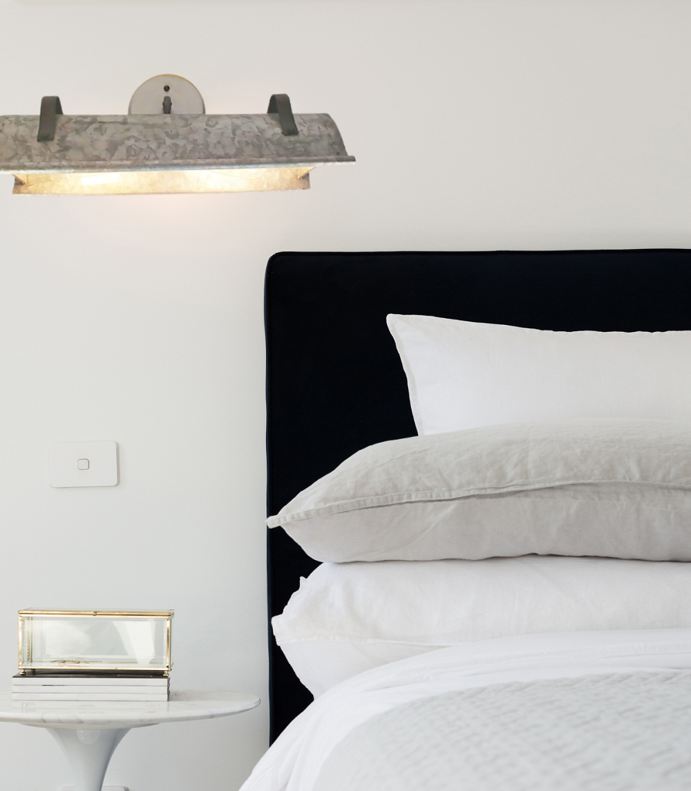 Discover the best techniques for perfectly hanging bedroom wall lights and sconces!
