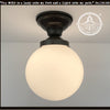 Modern Milk Glass 8" GLOBE Ceiling Light by The Lamp Goods; matte white glass shade, black metal fitting.