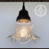 Antique 1930s hobnail glass pendant light, clear ruffled glass shade, black metal fixture.