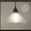 Frosted antique Holophane glass pendant light fixture with black metal canopy.