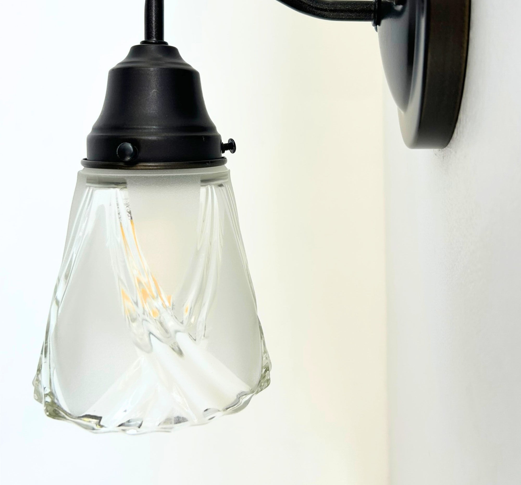 Frost and Clear Crossed Glass Wall Sconce