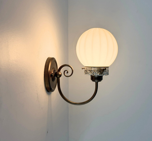 Ribbed Milk Glass Globe and Brass Wall Sconce