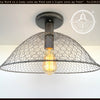 Chicken wire farmhouse ceiling light fixture with Edison bulb; The Lamp Goods.
