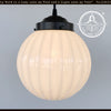 Authentic 1960s milk glass pendant light with ribbed detailing & black canopy.
