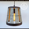 Galvanized metal industrial pendant light with open weave design and dark brown rim.
