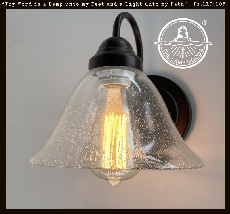 HEAVY SEEDED Antique Glass 1960s Shade Wall Sconce with black metal arm.
