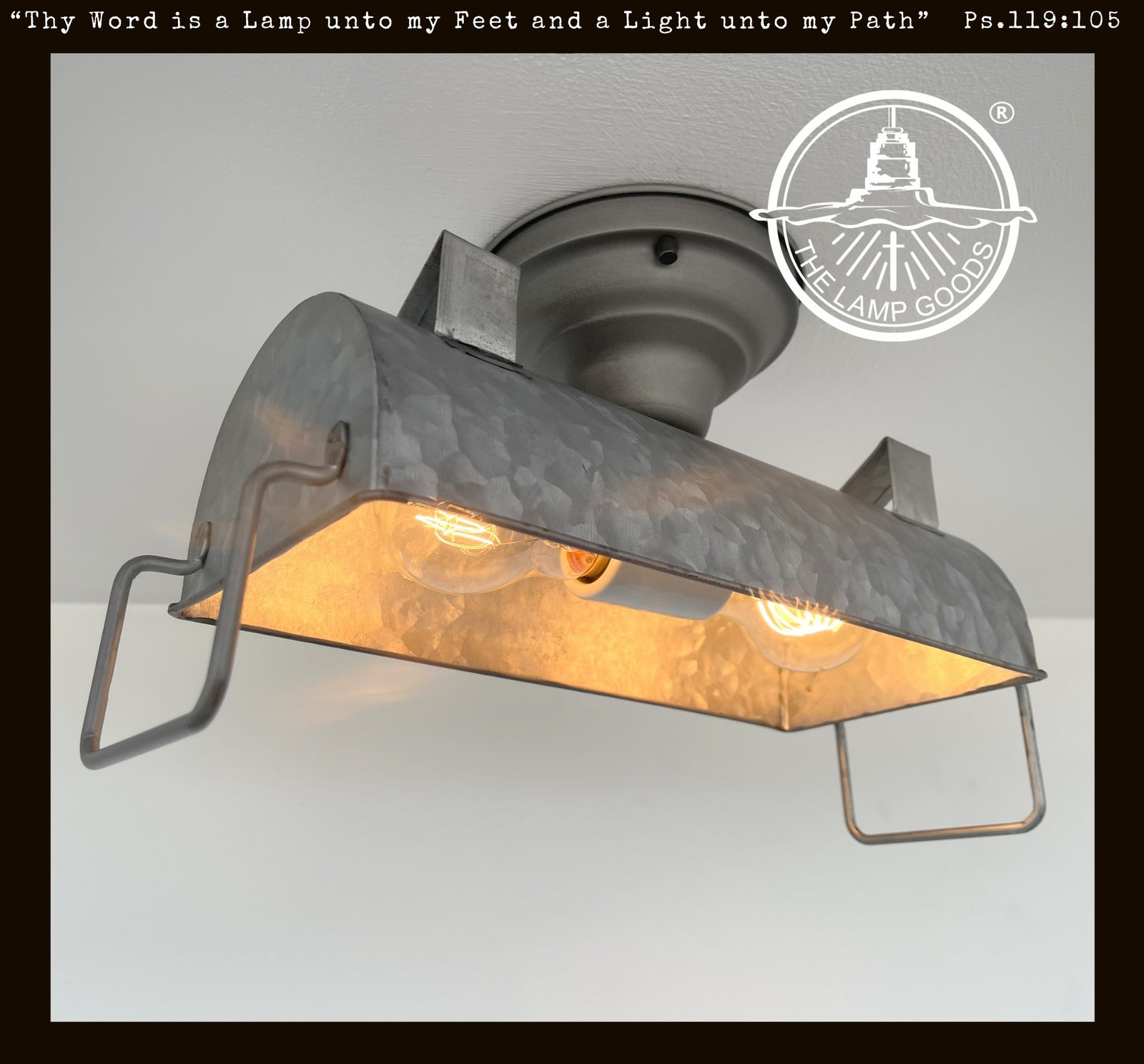 Industrial galvanized metal ceiling light fixture with two bulbs, from The Lamp Goods.
