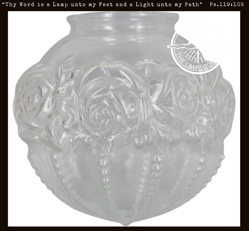 Clear glass globe lamp replacement with embossed rose design.

