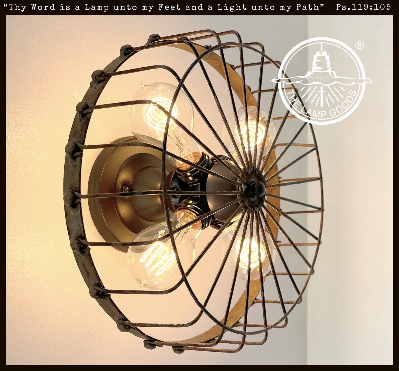 Rustic industrial 4-light wall fixture; metal cage design with exposed bulbs.
