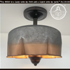 Galvanized metal ceiling light with copper accents from The Lamp Goods.
