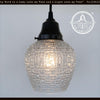 BRANDY DIAMOND Glass 1960s pendant light; mid-century modern clear glass shade with textured pattern & black metal fixture.
