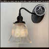 Antique Bell Glass Wall Sconces with ribbed glass shade; black metal finish.
