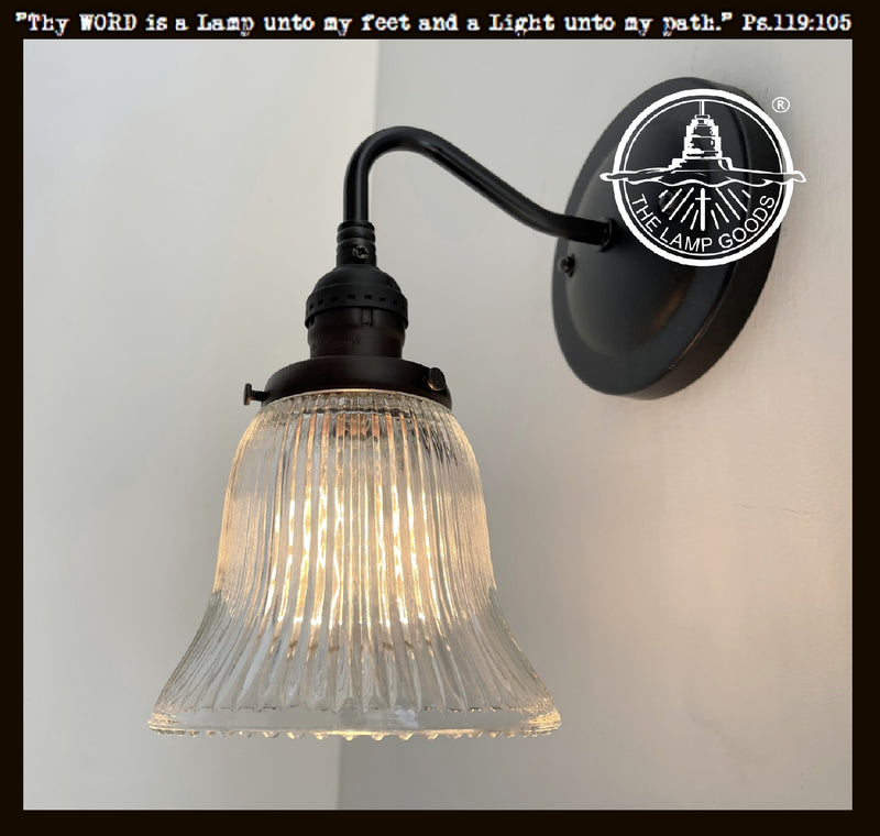 Antique Bell Glass Wall Sconces with ribbed glass shade; black metal finish.
