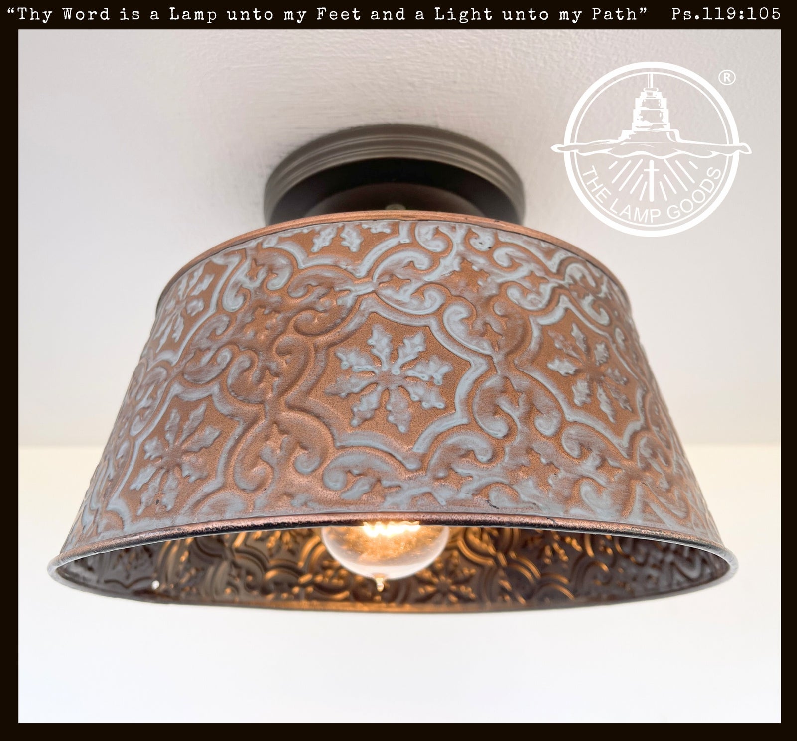 Ornate copper ceiling light fixture with embossed floral pattern; The Lamp Goods.
