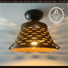 Rustic metal farmhouse ceiling light, pierced barn design, from The Lamp Goods.
