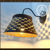 Galvanized farmhouse wall sconce with distressed metal shade; warm light.
