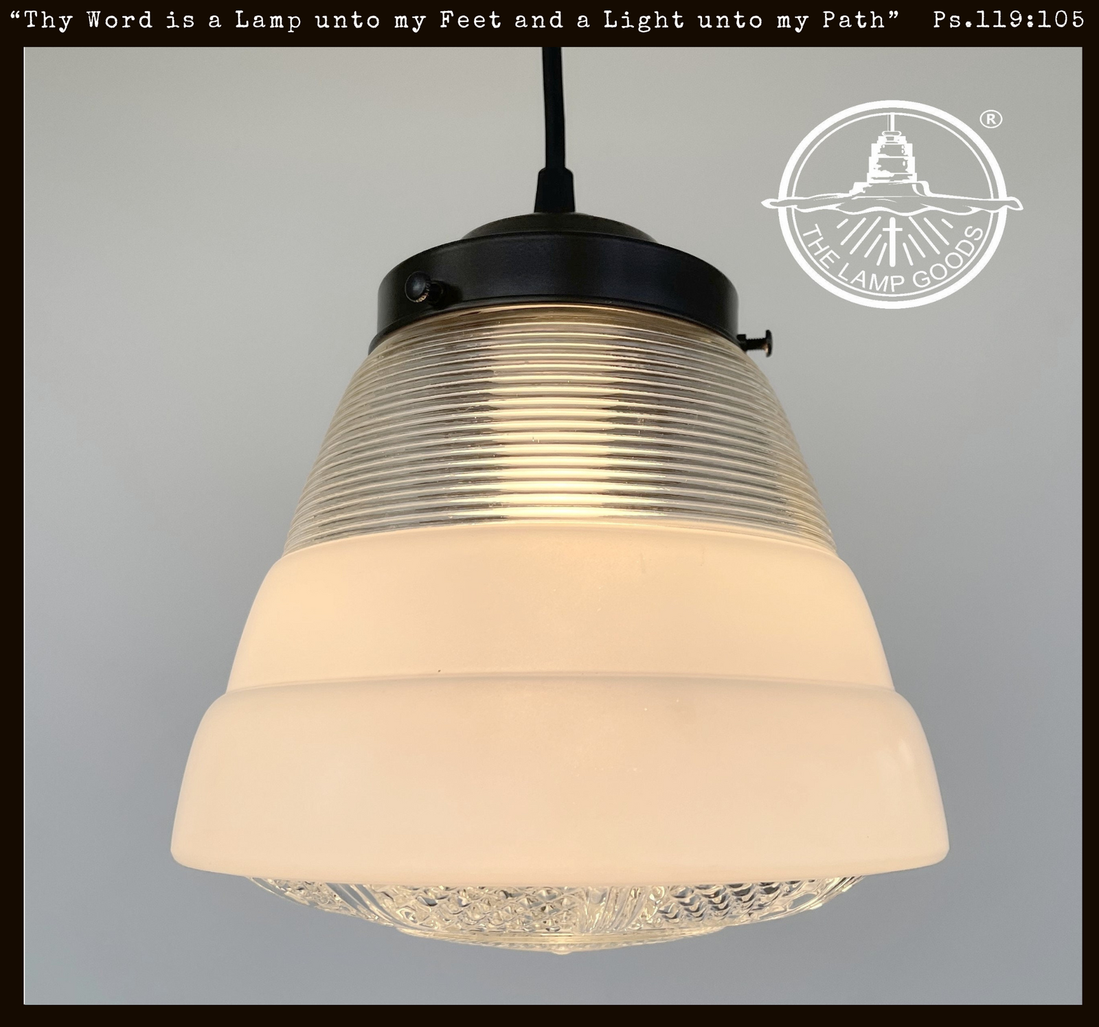 Retro 1970s mid-century glass pendant light; ribbed glass shade, opal glass diffuser, black metal canopy.
