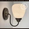 Modern 'Ribbon' 1970s milk glass wall sconce, bronze finish.
