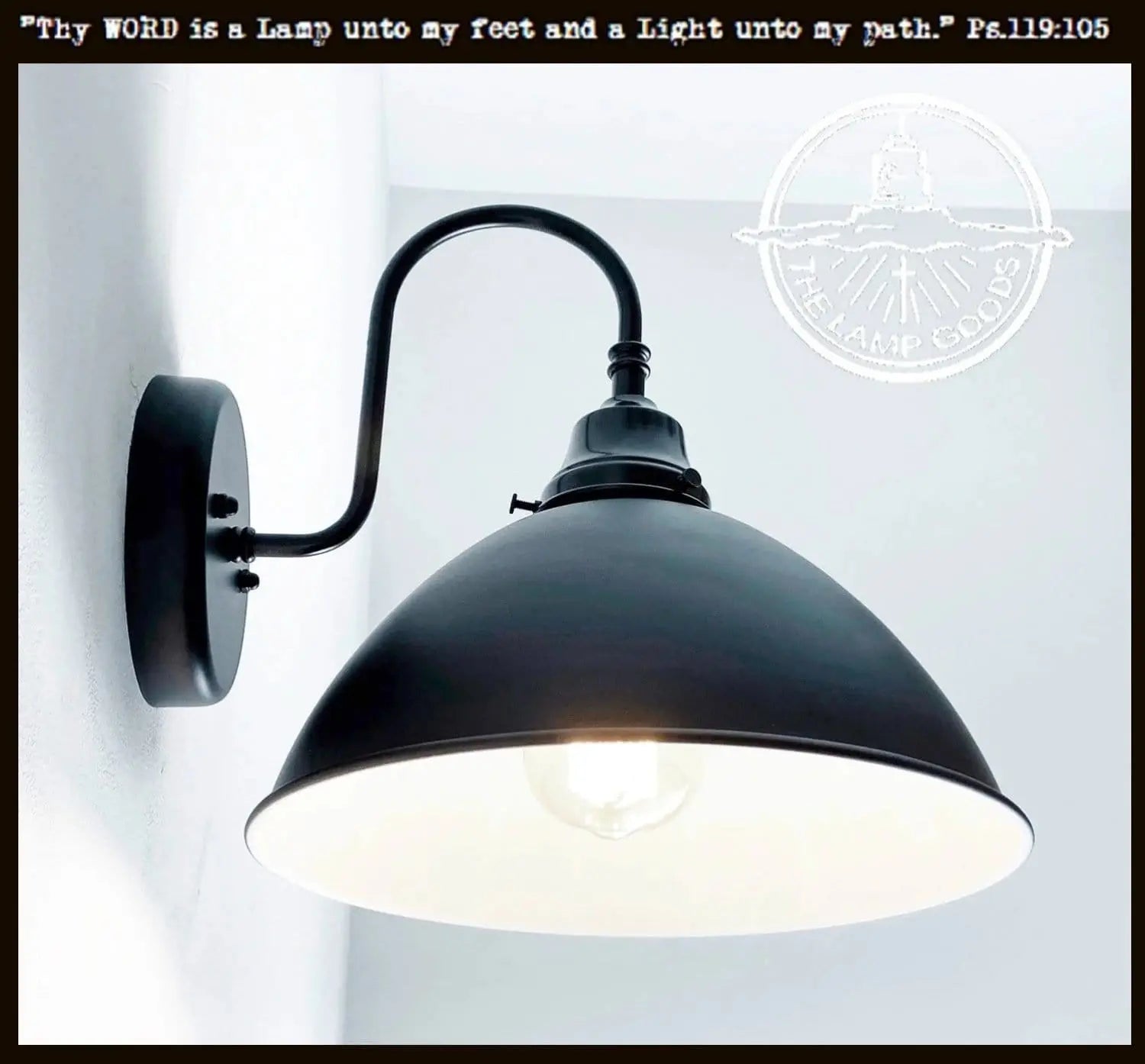 Black enamel farmhouse wall sconce with curved arm; adds rustic charm.
