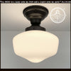 Modern Milk Glass Schoolhouse Ceiling Light Fixture with black metal canopy.
