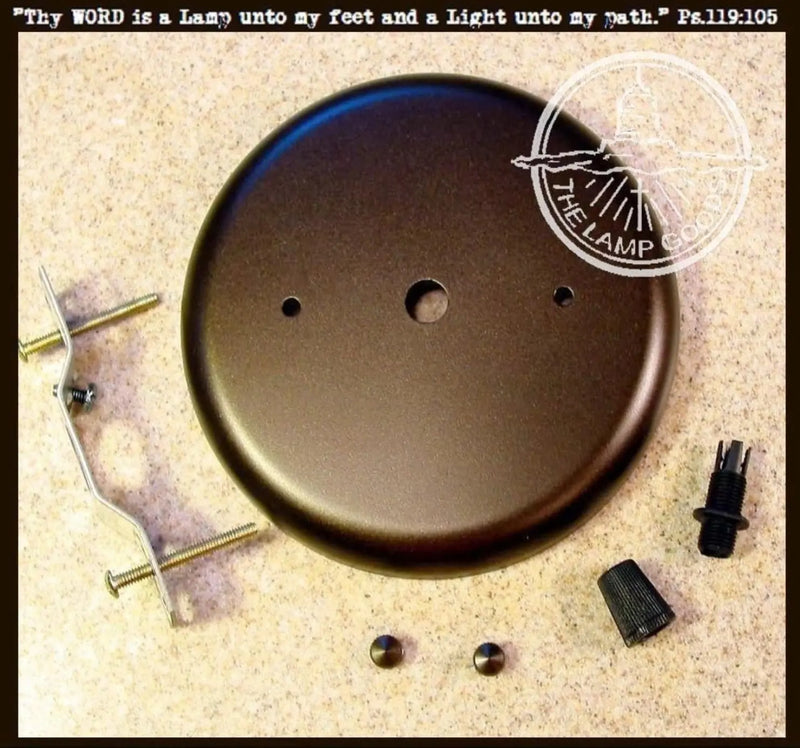 Bronze ceiling canopy mounting hardware kit with screws and mounting bracket.
