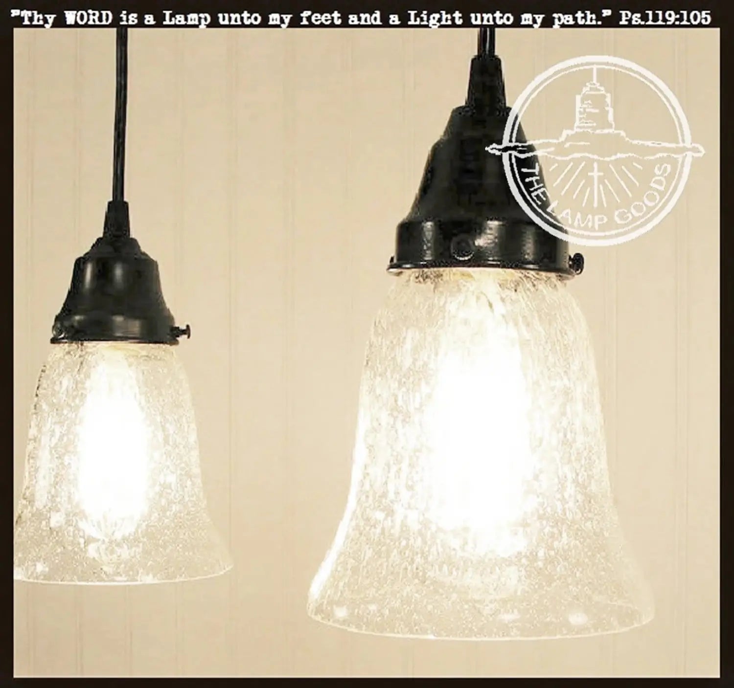 Clear seeded glass pendant light with black metal shade, perfect for farmhouse or vintage decor.

