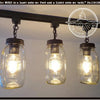 Mason Jar Quart Chain Trio track lighting fixture; three glass jars with Edison bulbs, dark bronze accents.
