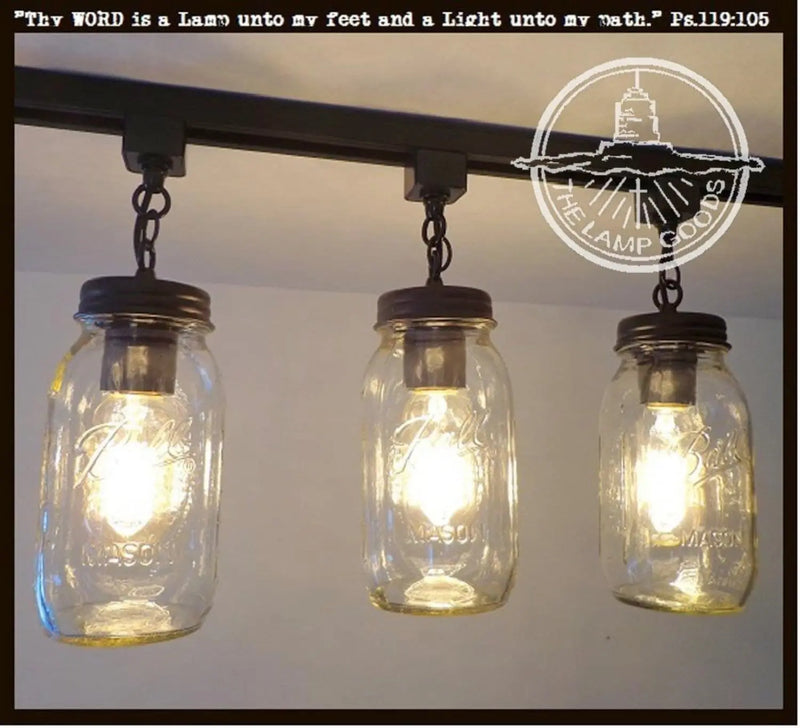 Mason Jar Quart Chain Trio track lighting fixture; three glass jars with Edison bulbs, dark bronze accents.

