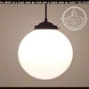 12" Opal milk glass globe pendant light fixture with black metal hardware.
