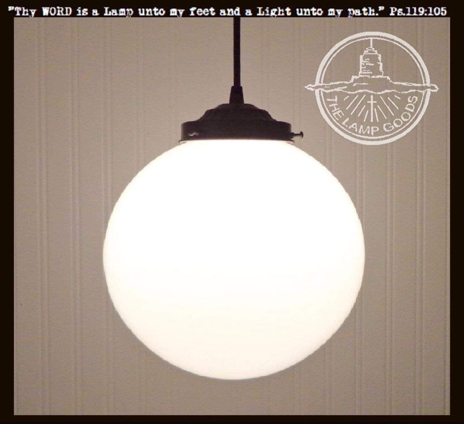 12" Opal milk glass globe pendant light fixture with black metal hardware.
