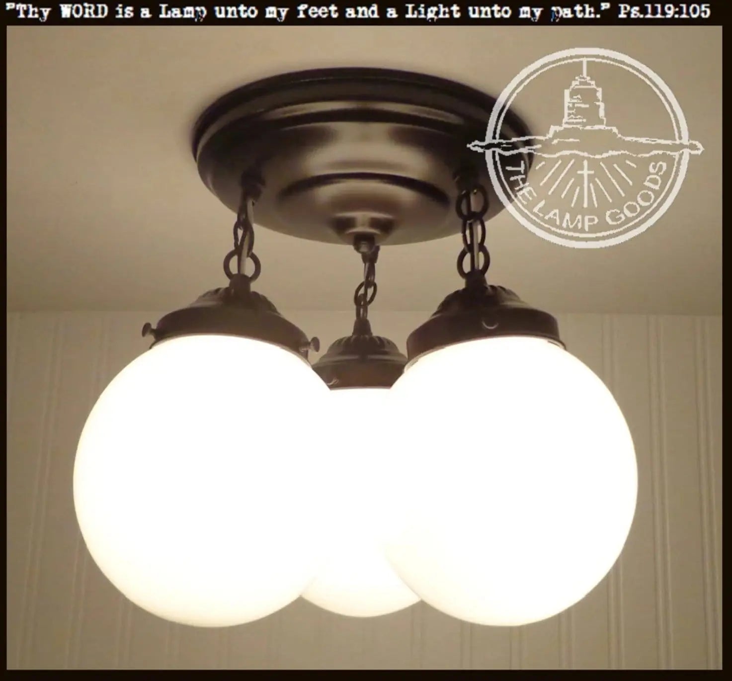 Milk glass opal globe ceiling light chain trio, black metal, 3-light fixture.
