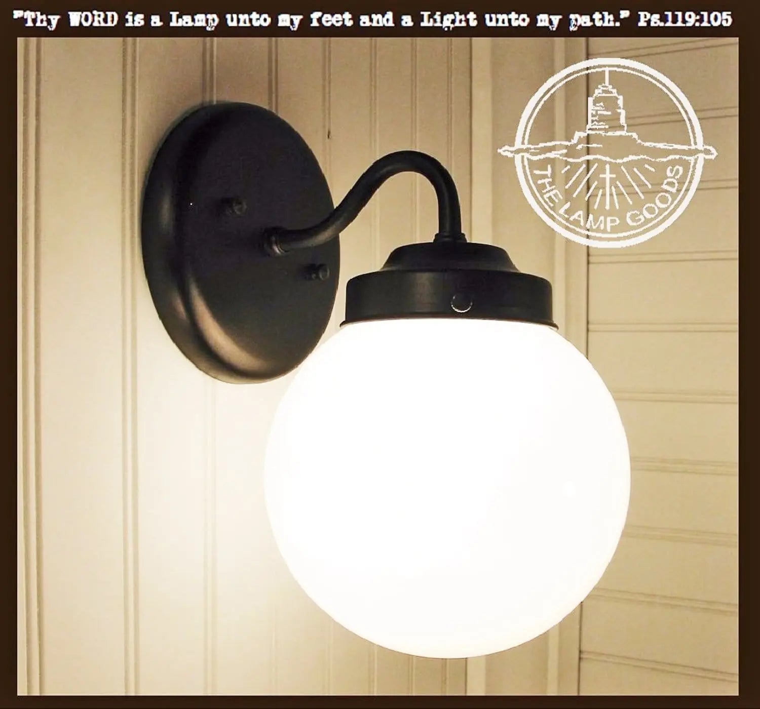 Milk glass globe wall light fixture sconce with black metal arm; The Lamp Goods.
