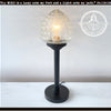 Antique glass table lamp with textured shade, black base, The Lamp Goods.
