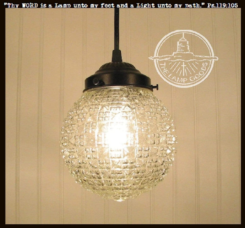Clear glass Diamond Square antique pendant light with bronze finish.
