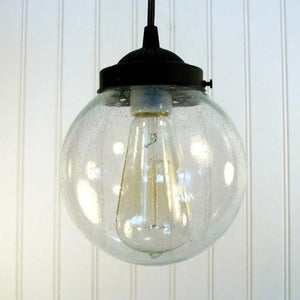 Detailed view of seeded glass pendant light