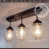 Antique glass ceiling light fixture, rectangular chain trio, featuring three textured glass shades.
