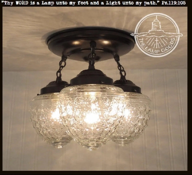 Antique Acorn Glass Ceiling Light Fixture: 3-light chain trio, clear glass shades.
