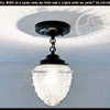 Acorn antique glass ceiling light with black chain, textured glass shade.
