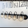 Antique glass 5-light bathroom vanity light fixture, black metal finish.
