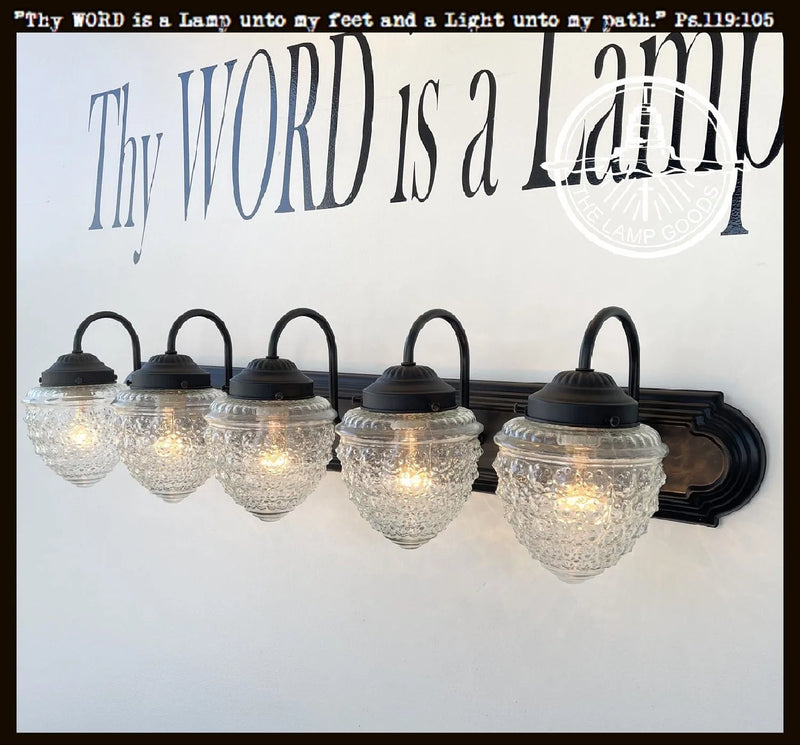 Antique glass 5-light bathroom vanity light fixture, black metal finish.
