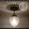 Vintage chain glass ceiling light; textured glass shade, dark bronze finish.
