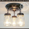 Mason Jar LIGHT FIXTURE Pint Chain Trio: 3-light, rustic farmhouse chandelier with dark bronze finish and Ball mason jars.
