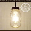 Mason jar quart pendant light with dark bronze top, perfect for rustic farmhouse decor.
