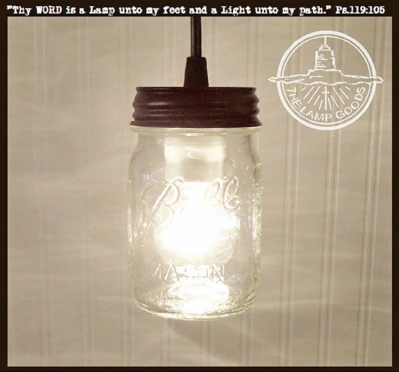 Mason jar pint pendant light with dark brown metal lid; The Lamp Goods.
