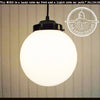 8" milk glass globe pendant light with black cord, perfect for adding vintage style to any room.
