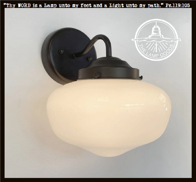 Modern Milk Glass Sconce Wall Light: Black metal sconce with a creamy white glass shade.
