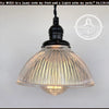 Antique glass Holophane pendant light with ribbed shade, black metal fitting, from The Lamp Goods.
