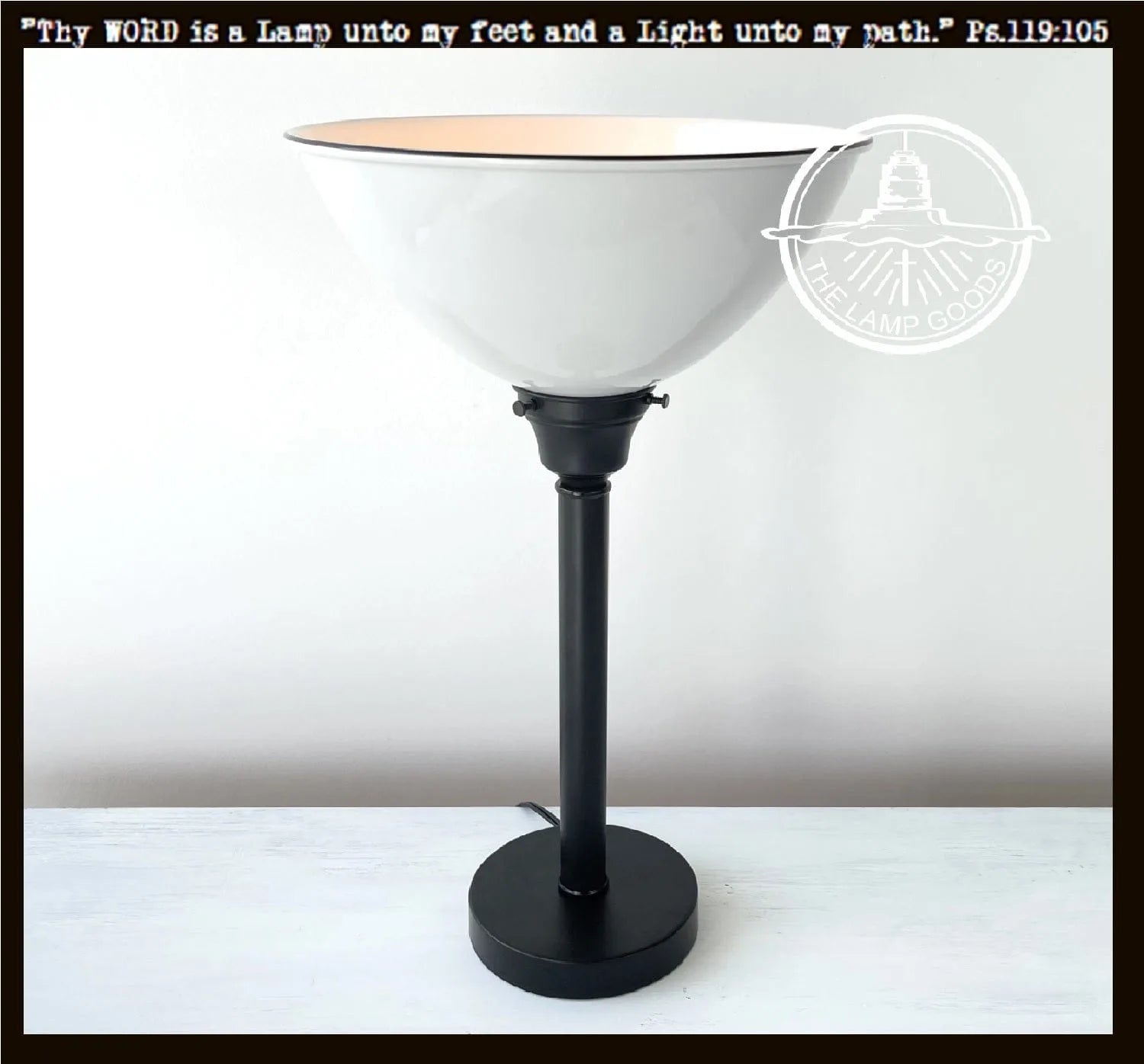 White modern farmhouse table lamp with black base.
